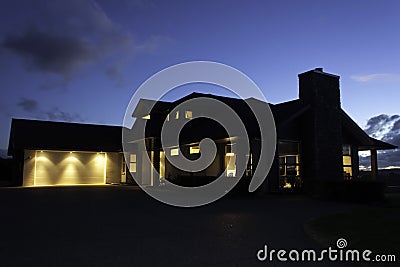 Modern house exterior with lighting at night Stock Photo