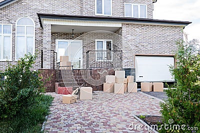 modern house with stacks of cardboard boxes Stock Photo
