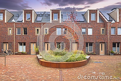 Modern houses with communal garden in the Netherlands Stock Photo