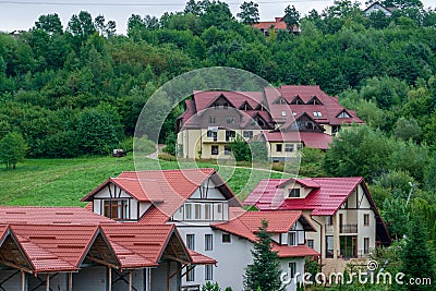 Modern houses on the hills from Bran, Brasov, Romania Stock Photo