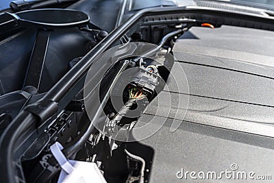 Modern 170hp diesel engine, visible wiring harness connected by a plug. Stock Photo