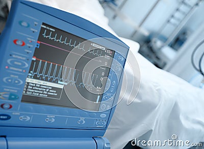 Modern ICU monitor in clinical ward next to the bed of the patient Stock Photo