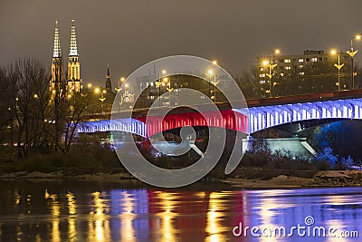Modern illuminated bridge in Warsaw - capital of Poland. Stock Photo