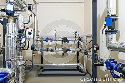 Modern industrial building with pipes, heat exchangers and valves Stock Photo
