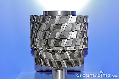 Modern industrial cutter on a blue background Stock Photo