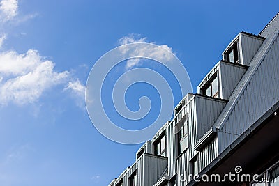 Modern interesting architecture against blue sky Stock Photo