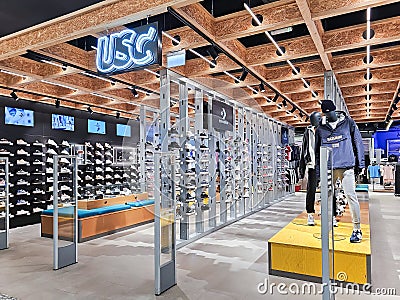 Modern interior of USC clothing retailer in Akropole shopping mall, Riga Editorial Stock Photo