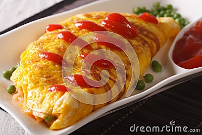 Modern Japanese food: Omurice close-up on a plate. horizontal Stock Photo