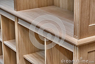 Modern joinery. Wooden bookcases in process of production in workshop. Furniture manufacture Stock Photo