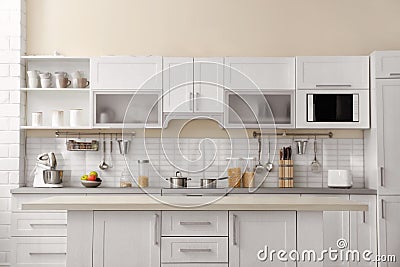 Modern kitchen interior with houseware Stock Photo