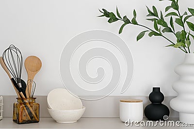 Modern kitchenware and decor on surface in kitchen Stock Photo