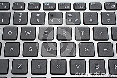 Modern laptop QWERTY keyboard closeup Stock Photo