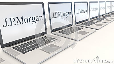 Modern laptops with J.P. Morgan logo. Computer technology conceptual editorial 3D rendering Editorial Stock Photo