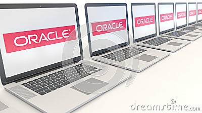 Modern laptops with Oracle Corporation logo. Computer technology conceptual editorial 3D rendering Editorial Stock Photo