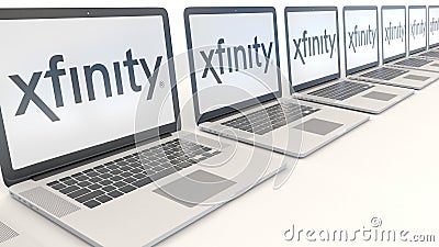Modern laptops with Xfinity logo. Computer technology conceptual editorial 3D rendering Editorial Stock Photo