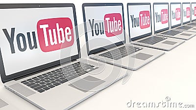 Modern laptops with YouTube logo. Computer technology conceptual editorial 3D rendering Editorial Stock Photo
