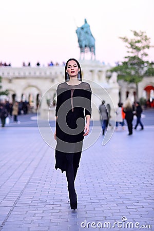 Modern life with princess in celebrity style. Fashion and beauty of business lady. Luxury woman in evening dress in city Stock Photo