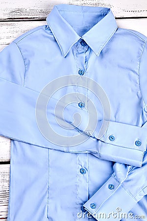 Modern light blue woman shirt. Stock Photo