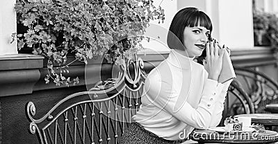 Modern literature for female. Coffee and good book for perfect weekend. Business lady read book during coffee break Stock Photo