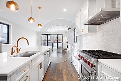 A modern luxurious kitchen with white and black cabinets. Editorial Stock Photo