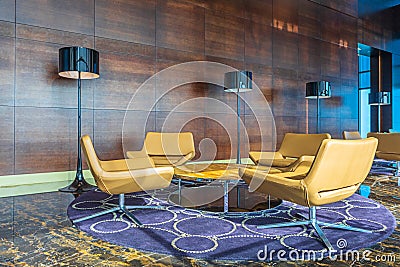 Modern luxury business lounge area background with table and leather seats Stock Photo