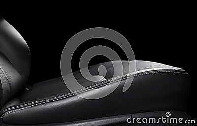 Modern luxury car black leather interior. Part of leather car seat details with stitching. Interior of prestige modern car. Comfor Stock Photo