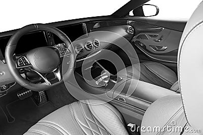 Modern Luxury car inside. Interior of prestige modern car. Comfortable leather seats. Perforated leather cockpit. Modern car inter Stock Photo