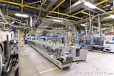 Modern machines for transportation in a large print shop for production of newspapers & magazines Stock Photo