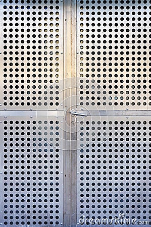 Modern metal doors. Perforated steel Stock Photo