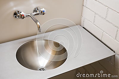 Modern metal sink Stock Photo