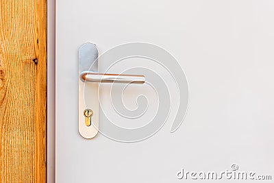 Modern metallic door handle Stock Photo
