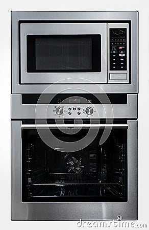 Modern metallic oven and microwave Stock Photo