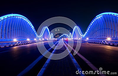 Meydan bridge in Dubai at night Stock Photo