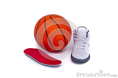 Modern mid-high white basketball shoes sneakers with orthotic inserts Stock Photo