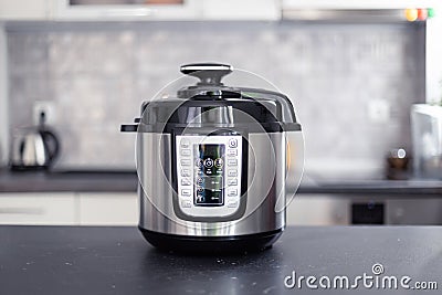 Modern multi cooker in the kitchen Stock Photo