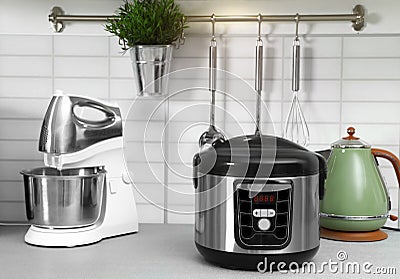 Modern multi cooker and kitchen appliances Stock Photo