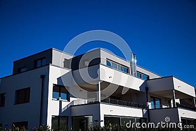 Modern multi family house in munich, blue sky Stock Photo