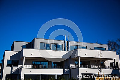 Modern multi family house in munich, blue sky Stock Photo