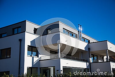 Modern multi family house in munich, blue sky Stock Photo