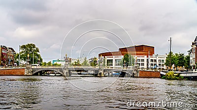 Modern National Opera and Ballet Center along the canals of Amsterdam Stock Photo