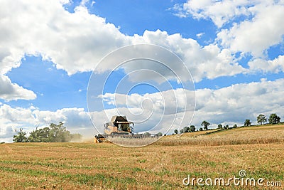 Modern New Holland combine harvester cutting crops Editorial Stock Photo