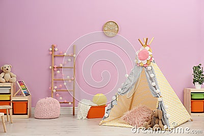 Modern nursery room interior with play tent Stock Photo