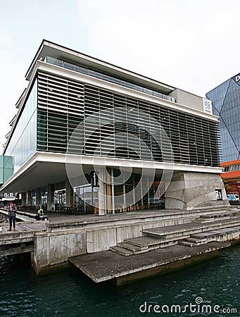 Modern Meridian Energy Building with louvre screen, seafront deck, stairs on water in North Kumutoto, Wellington CBD, New Zealand Editorial Stock Photo