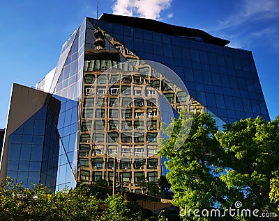 Modern office building and the old TVR headquarter in the mirror Stock Photo