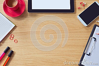 Modern office table background with table, smart phone, notepad and coffee cup. View from above with copy space Stock Photo