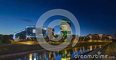 Modern and old buildings in a beautiful Vilnius night panorama Editorial Stock Photo