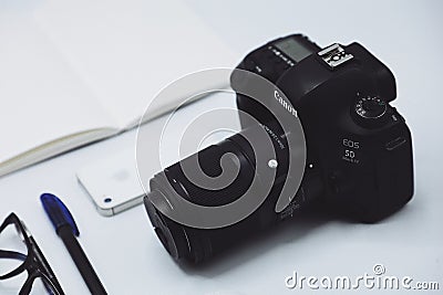 Modern photography equipment over white table background Editorial Stock Photo