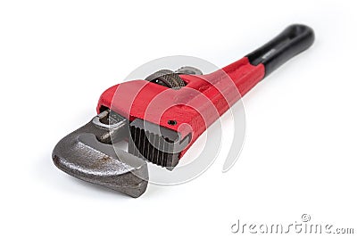 Modern pipe wrench on a white background, closeup in selective focus Stock Photo