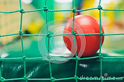 Modern playground indoor. Kids jungle in a play room. Round tunnel in children gym. Stock Photo