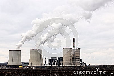 Modern power plant exhausting large amount of vapor Stock Photo